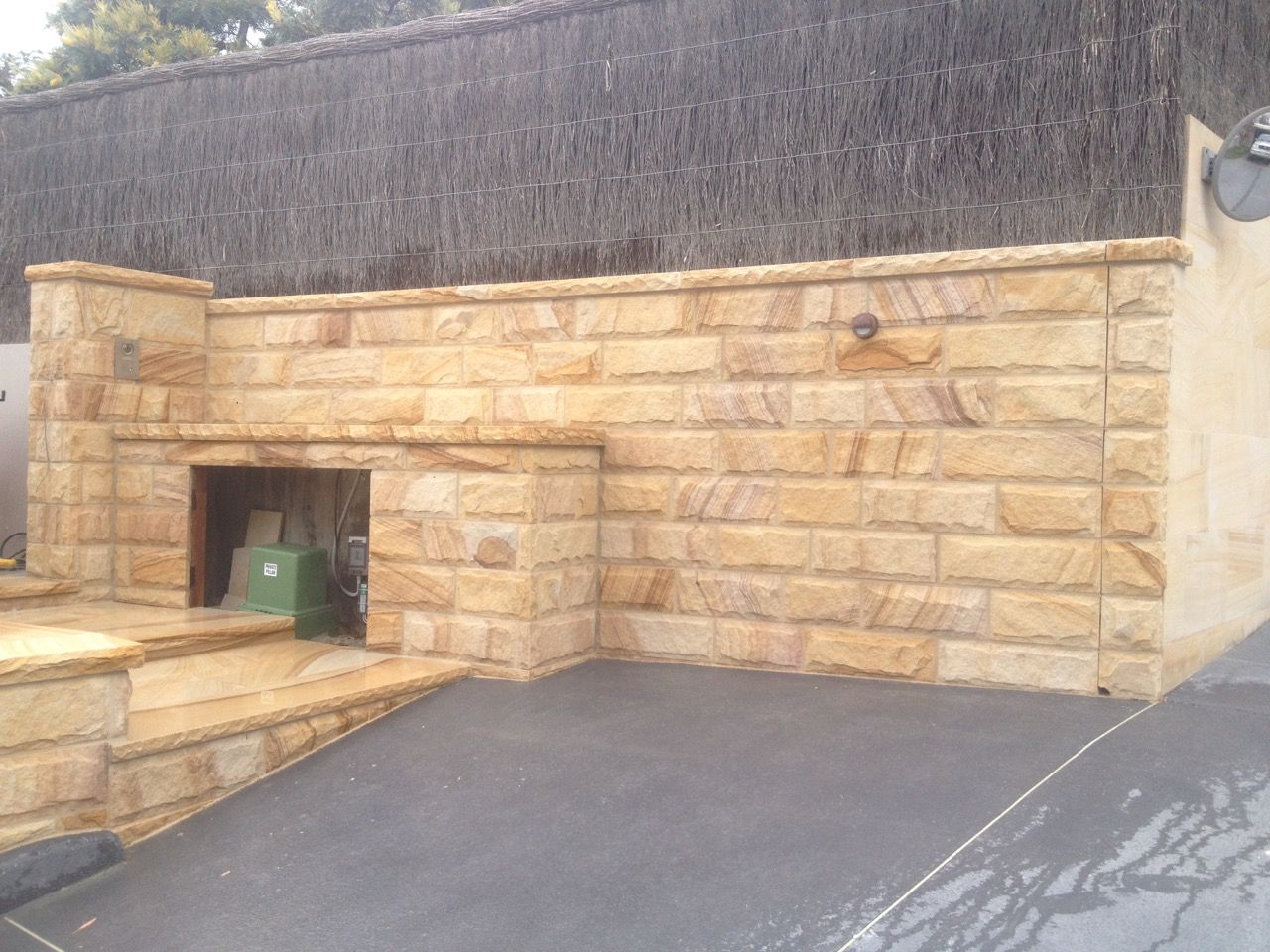 Sandstone wall built by Mega Stoneworks
