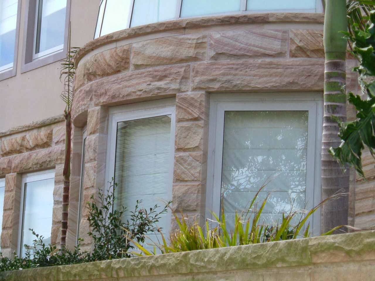 Curved sandstone cladding — Mega Stoneworks Sydney